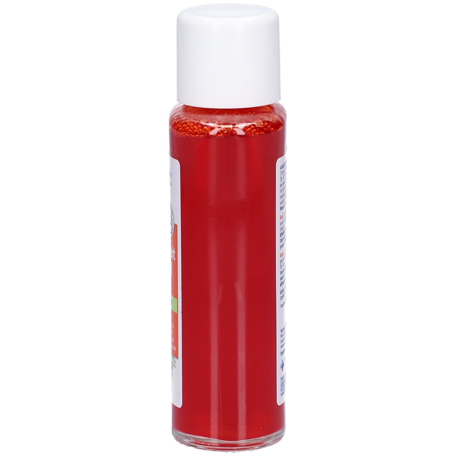 tetesept Beweglichkeit Intensiv Bad. Bouteille de liquide orange avec bouchon blanc.