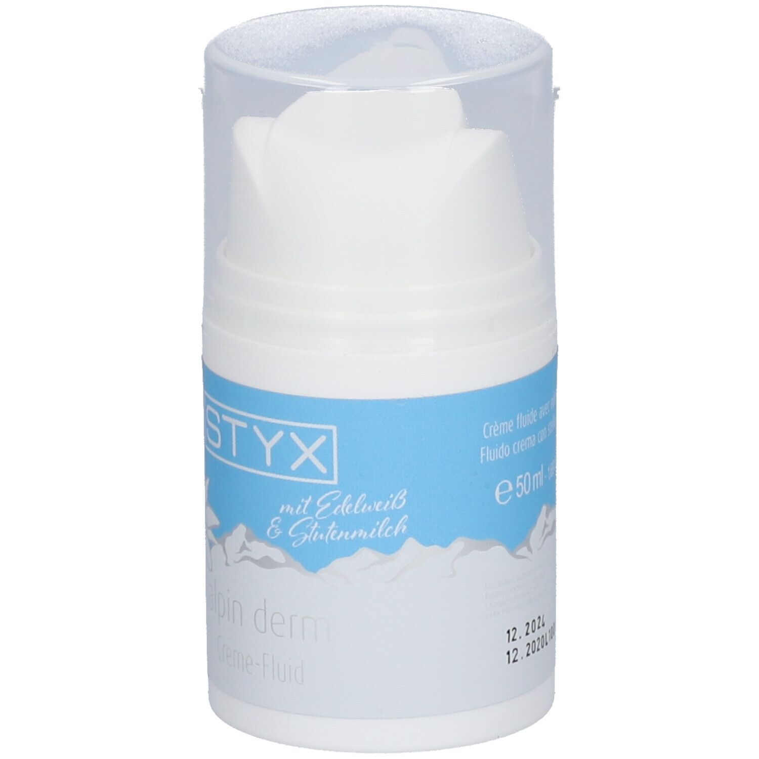 Distributeur blanc avec étiquette bleue. Inscription STYX, fleur des Alpes, alpin derm Creme-Fluid. Avec Edelweiss & Lait de brebis.