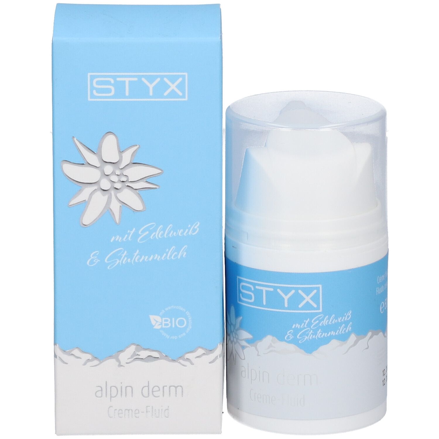 Emballage du produit et distributeur. Boîte bleue avec logo STYX, fleur des Alpes, alpin derm Creme-Fluid. Avec Edelweiss & Lait de brebis.
