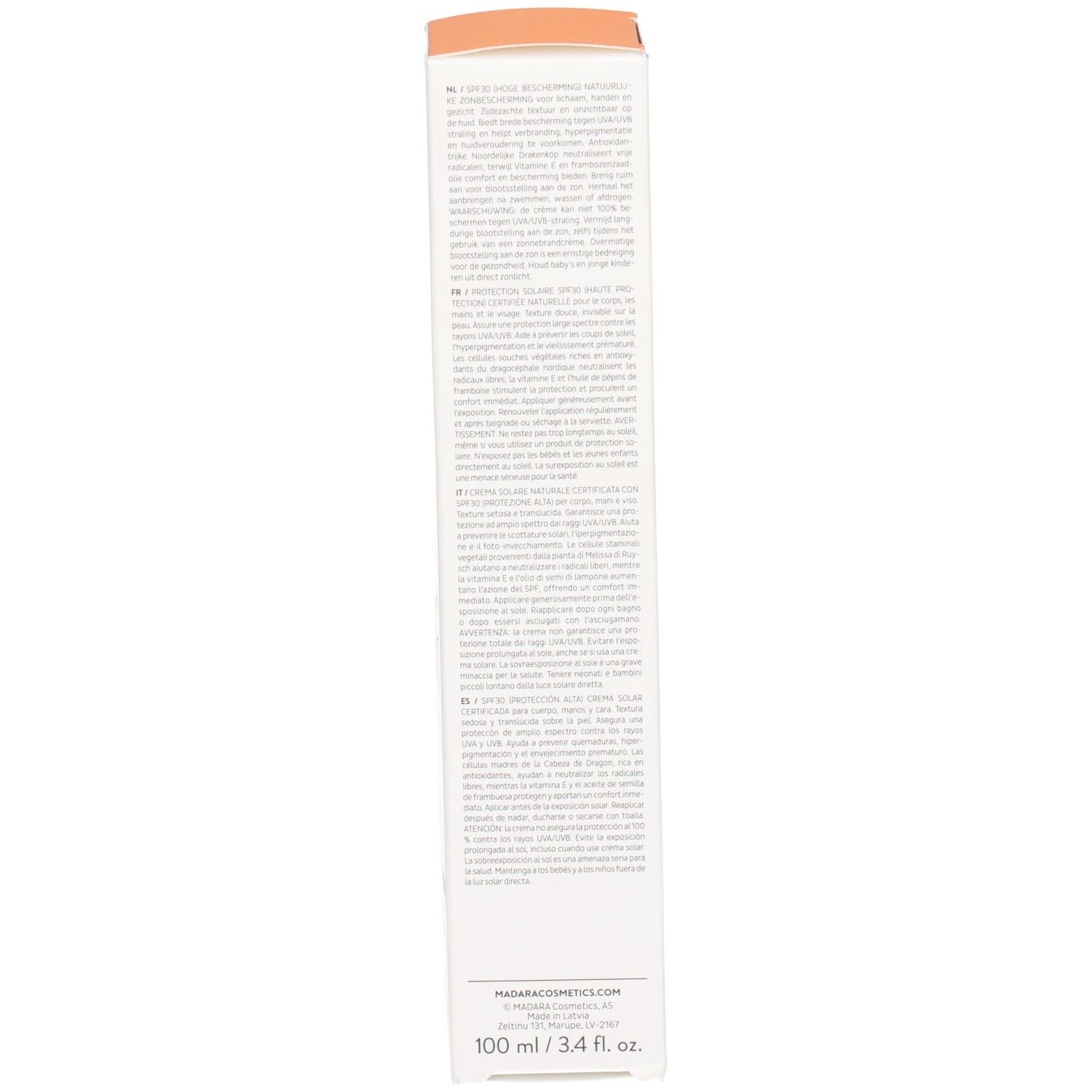 Emballage en carton, côté. Texte en plusieurs langues. Contient des informations sur la crème solaire. Marque: MADARA.