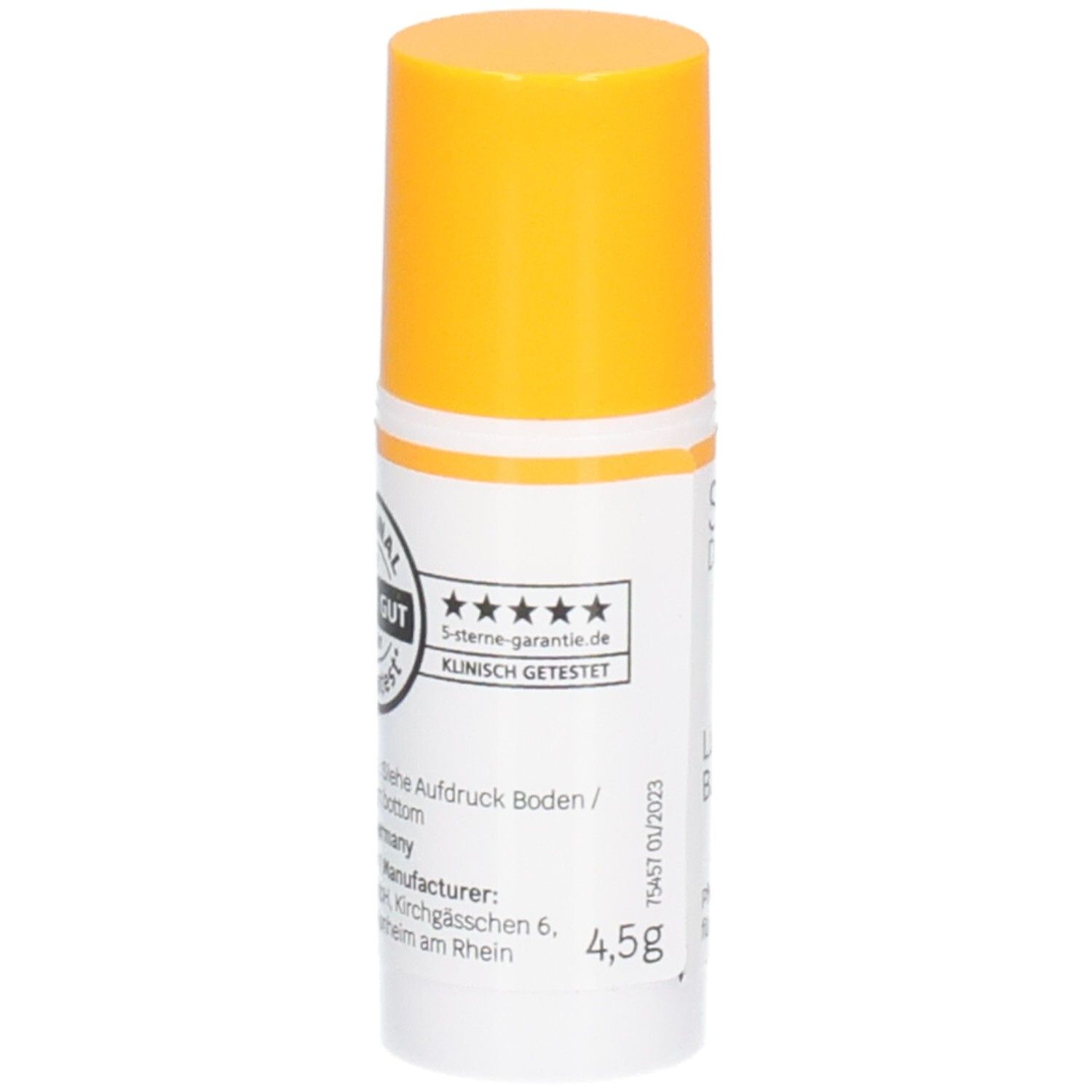 Stick de baume à lèvres blanc et jaune. Inscription : SIRIDERMA, Lippen Balsam, SPF 30. Avec couvercle jaune.