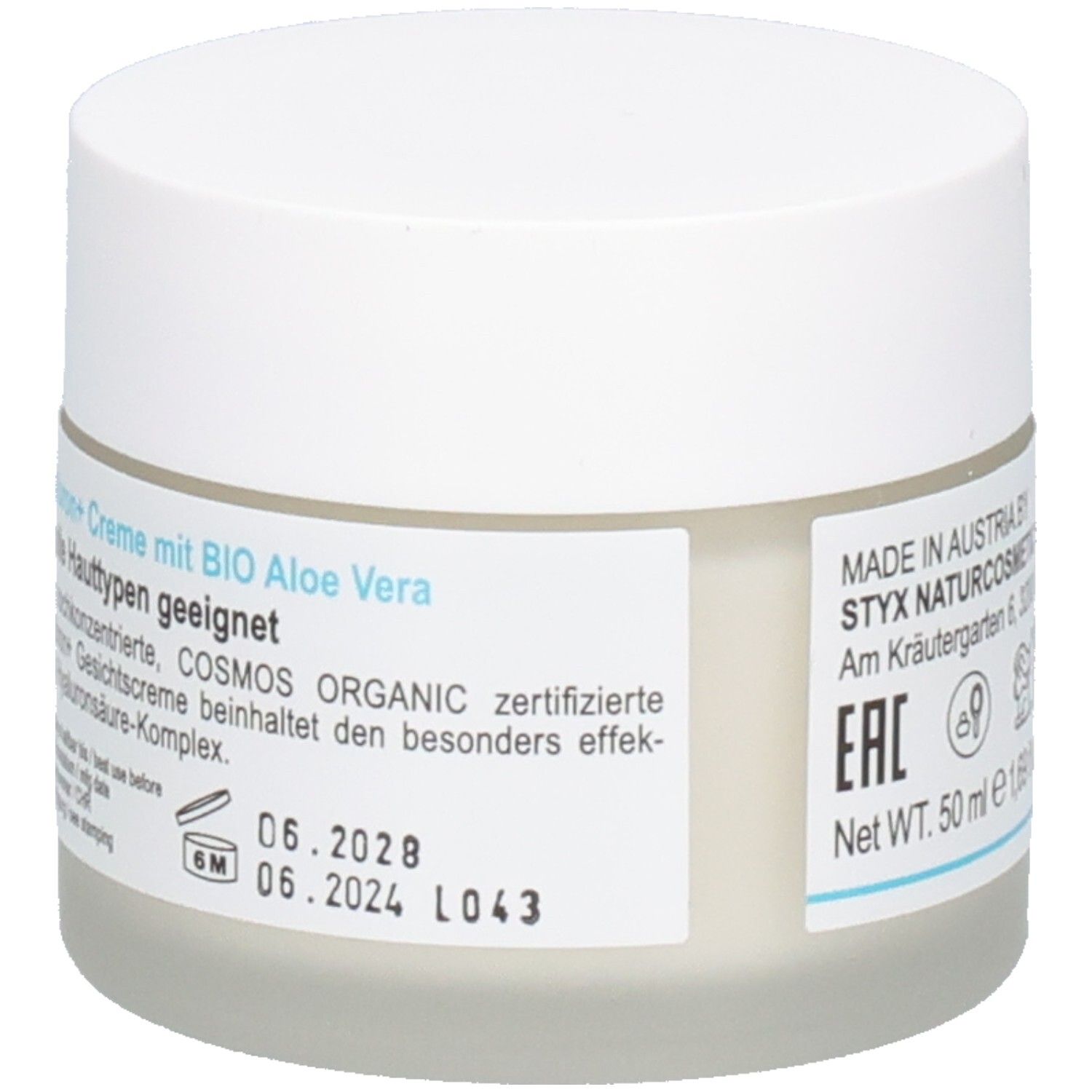 Pot de crème avec couvercle blanc. Inscription : STYX NATURCOSMETIC, Net Wt. 50 ml e 1,69 fl oz.
