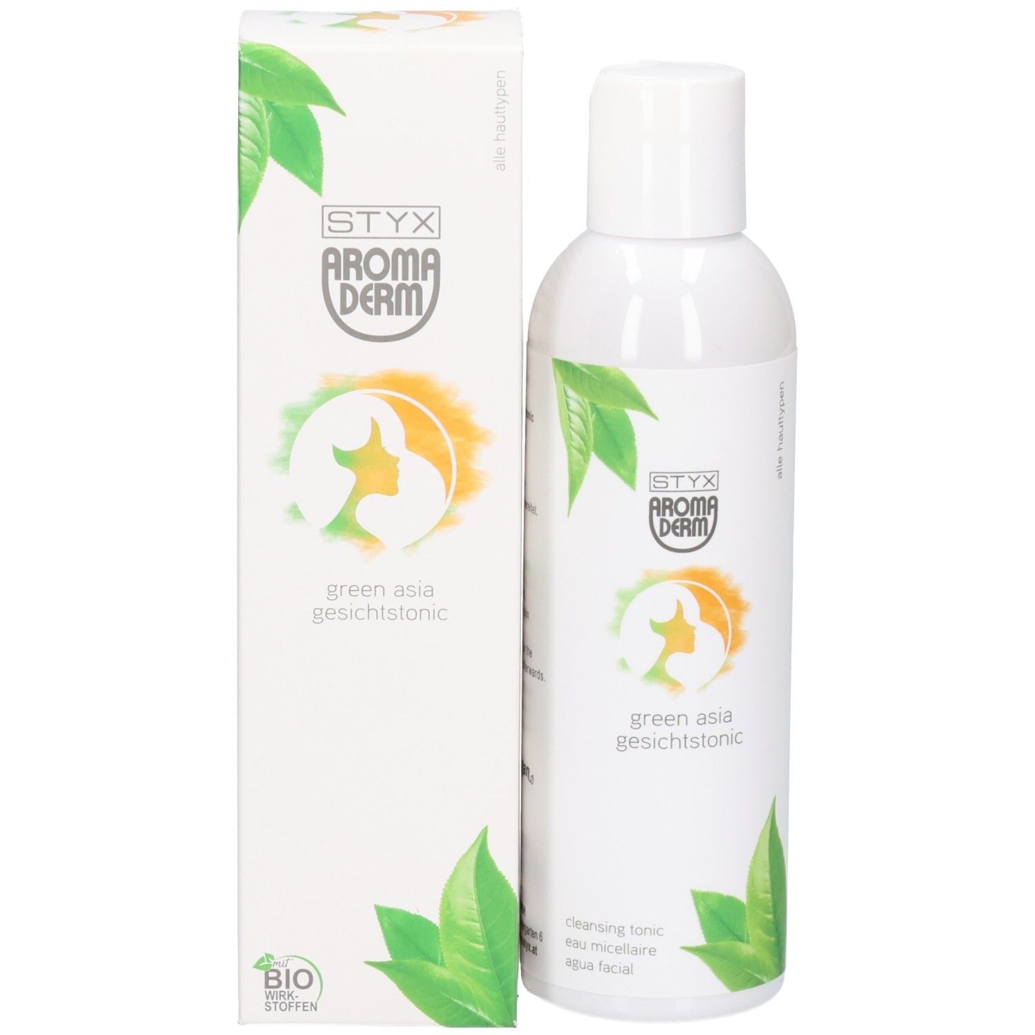 Produit et emballage. Flacon et boîte blancs. Inscription: STYX AROMADERM, green asia Gesichtstonic. Décor de feuilles.