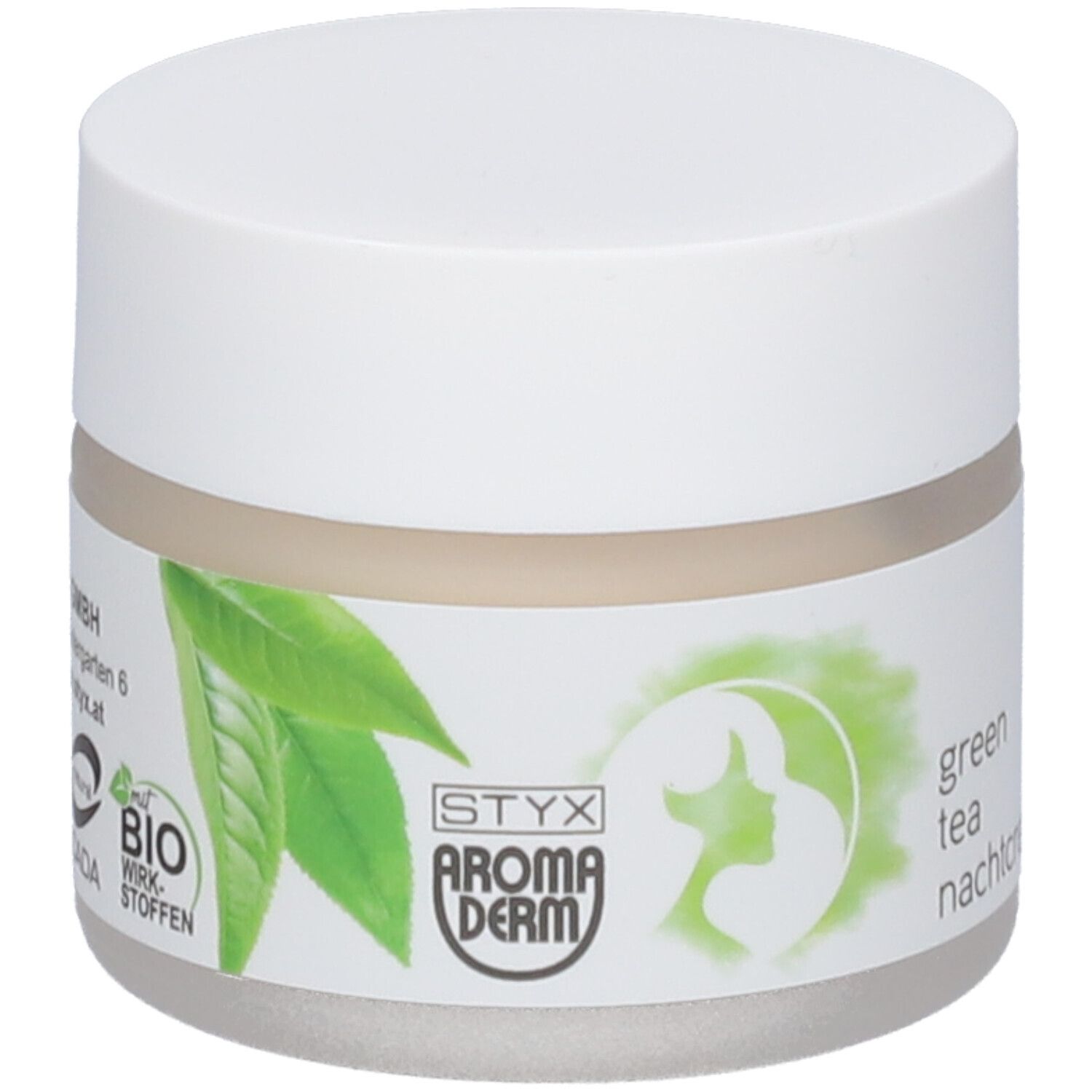 Pot de crème avec couvercle blanc. Étiquette : STYX AROMADERM, feuilles vertes, crème de nuit au thé vert, label bio.