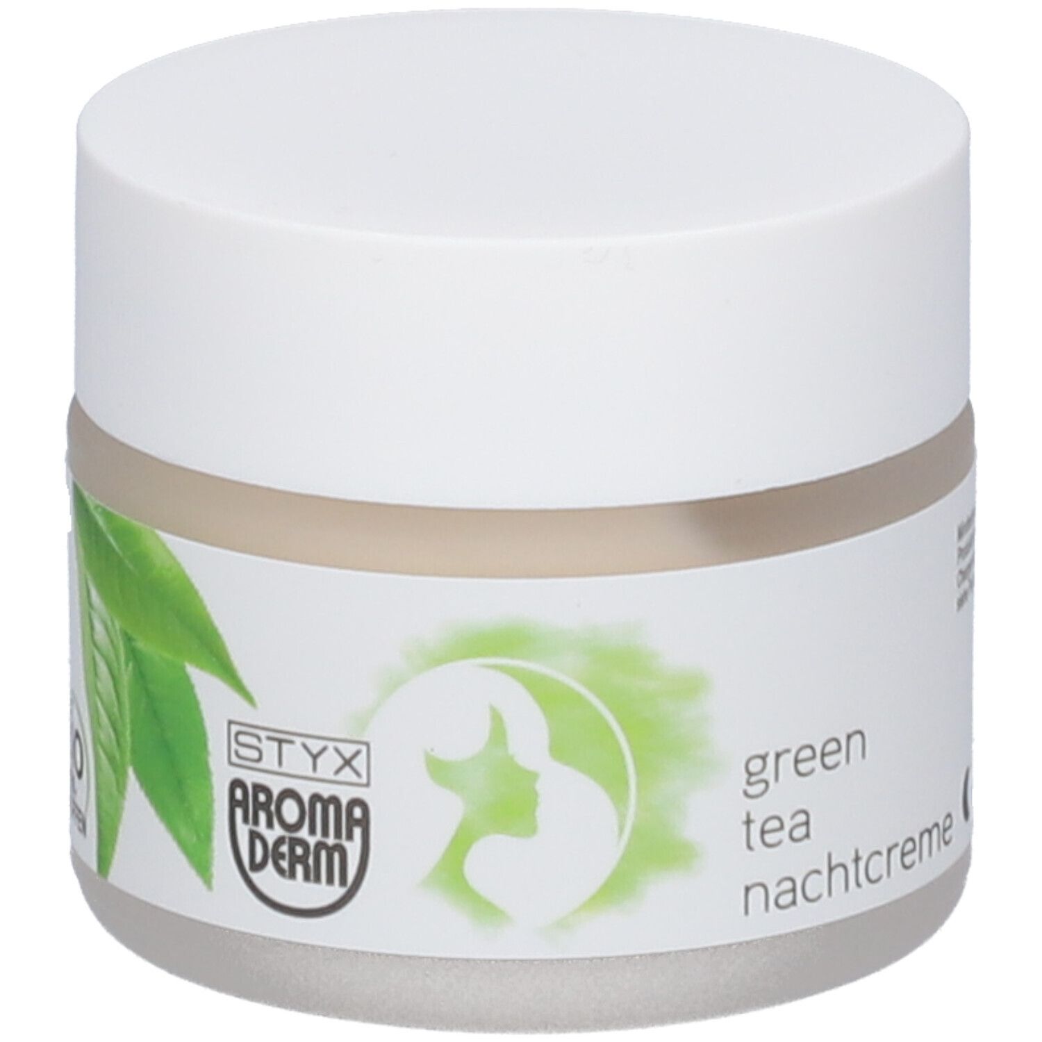 Pot de crème avec couvercle blanc. Étiquette : STYX AROMADERM, feuilles vertes, crème de nuit au thé vert, label bio.