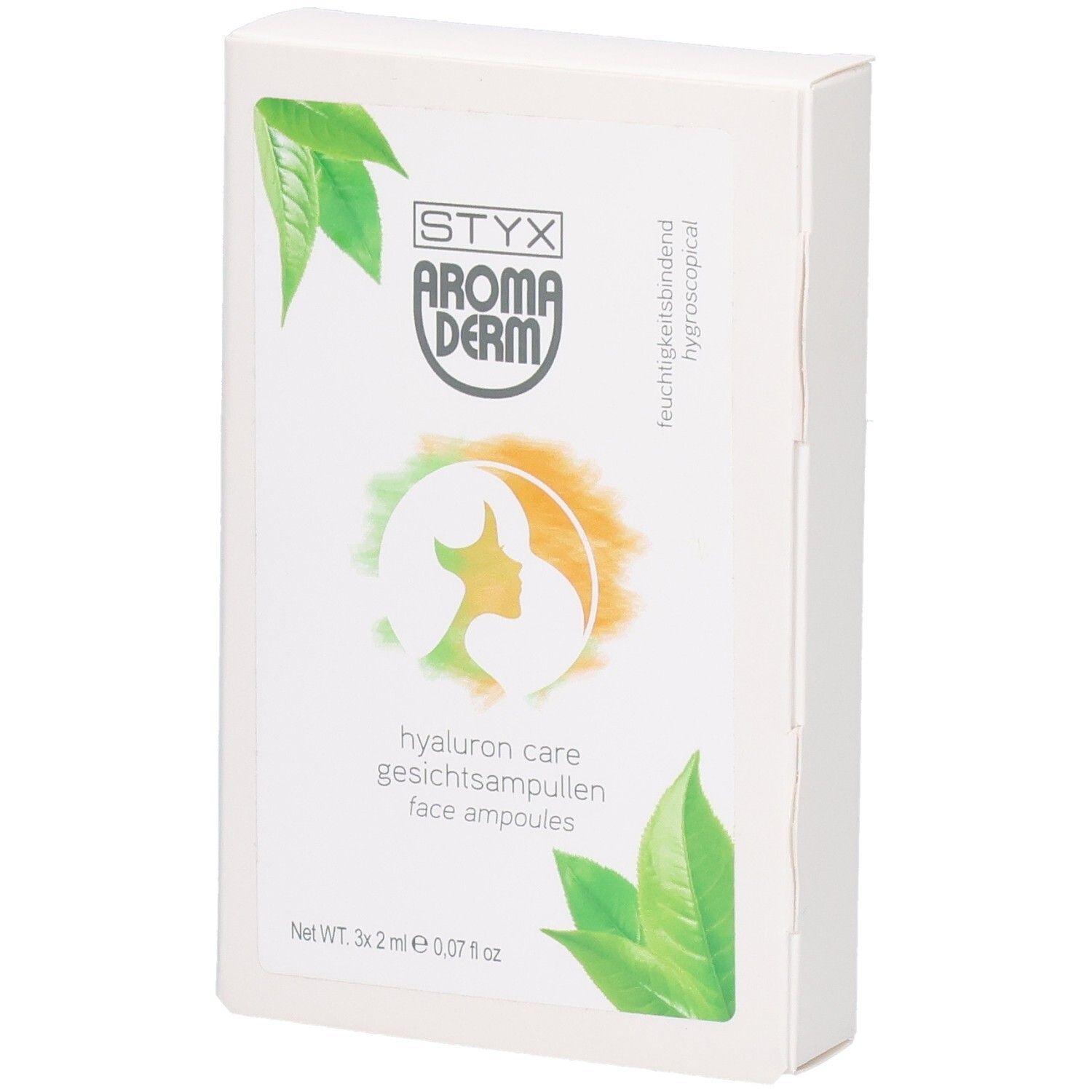 Boîte blanche avec STYX AROMADERM Hyaluron Care Gesichtsampullen. Logo, feuilles vertes et nom du produit.