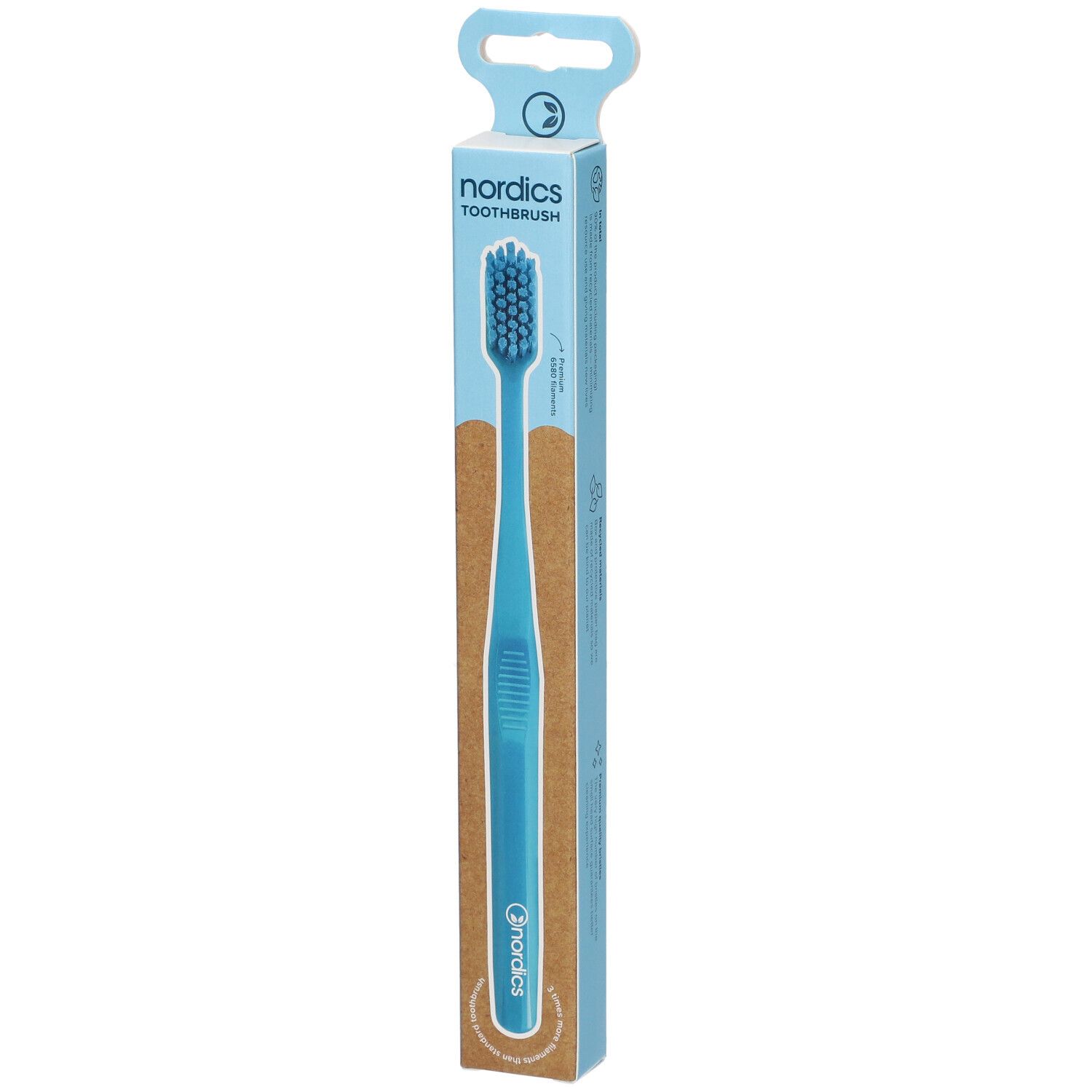 Brosse à dents dans son emballage. Produit bleu avec tête de brosse bleue. Marque : nordics TOOTHBRUSH.