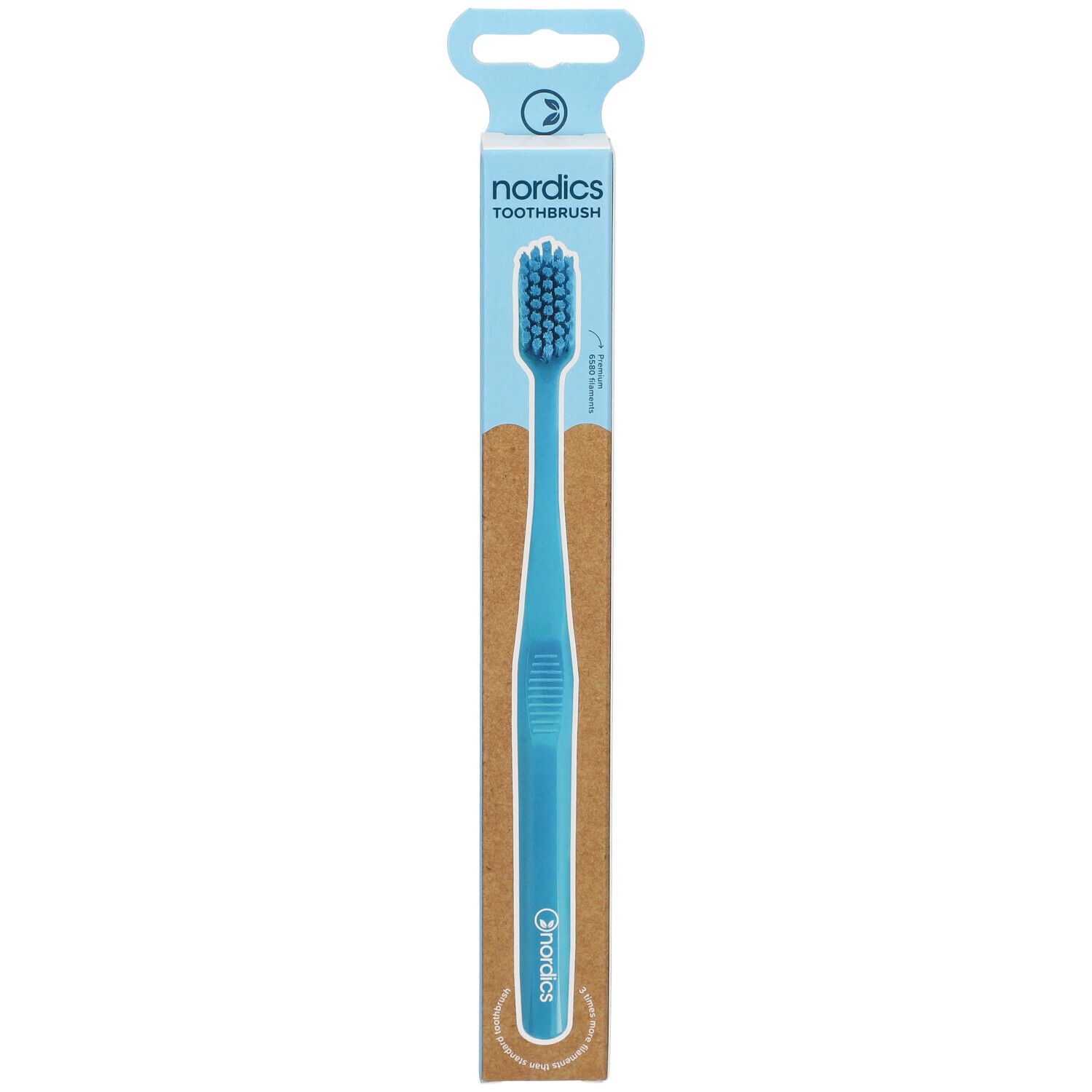 Brosse à dents dans son emballage. Produit bleu avec tête de brosse bleue. Marque : nordics TOOTHBRUSH.