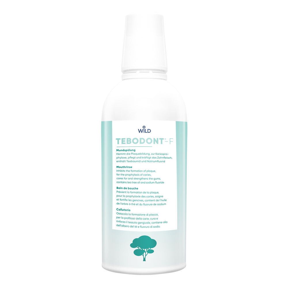 Bain de bouche TEBODONT-F en flacon blanc avec étiquette verte. Logo d'arbre en bas. Texte en allemand, anglais, français, italien.