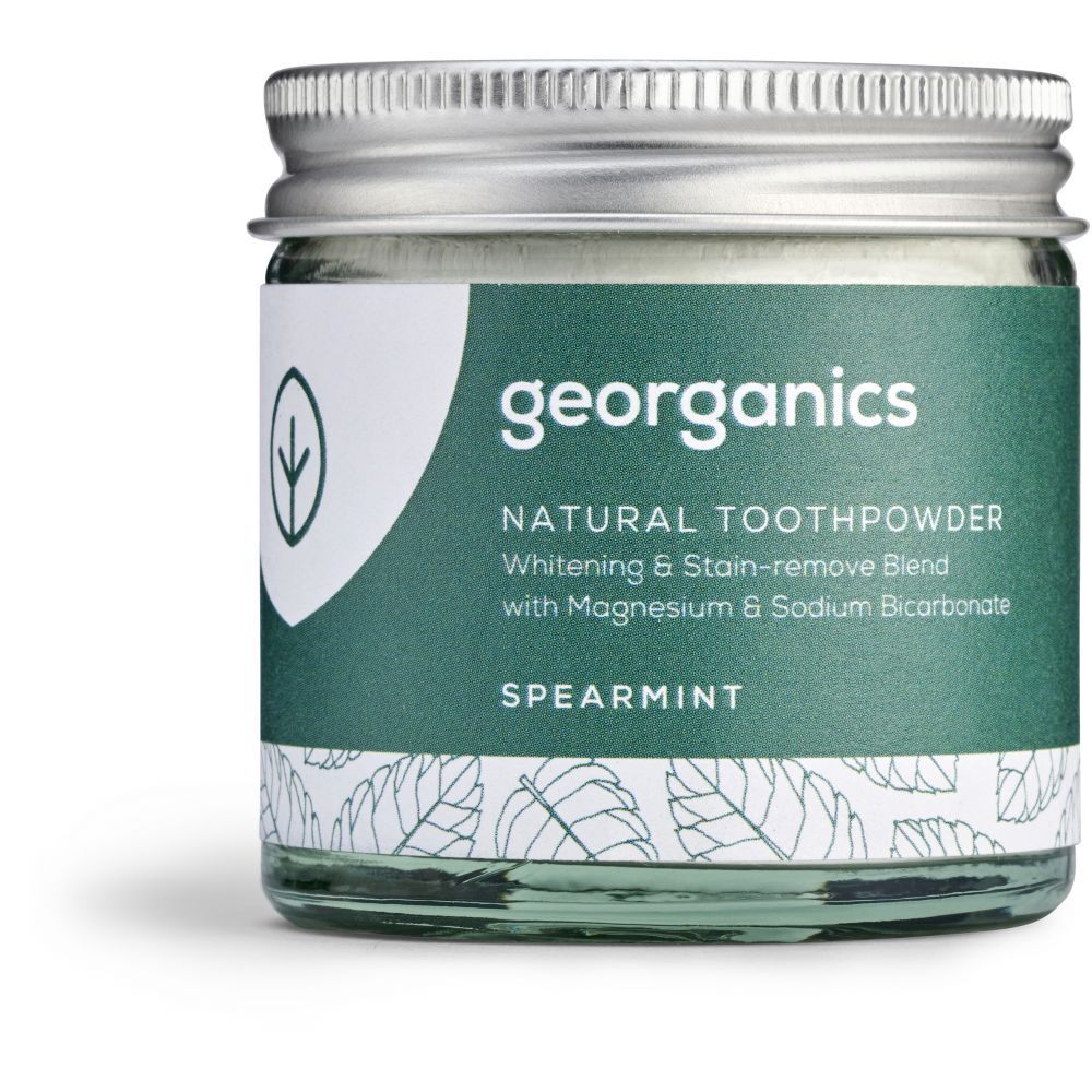 Poudre dentifrice en pot de verre. Inscription: georganics, Natural Toothpowder Spearmint.