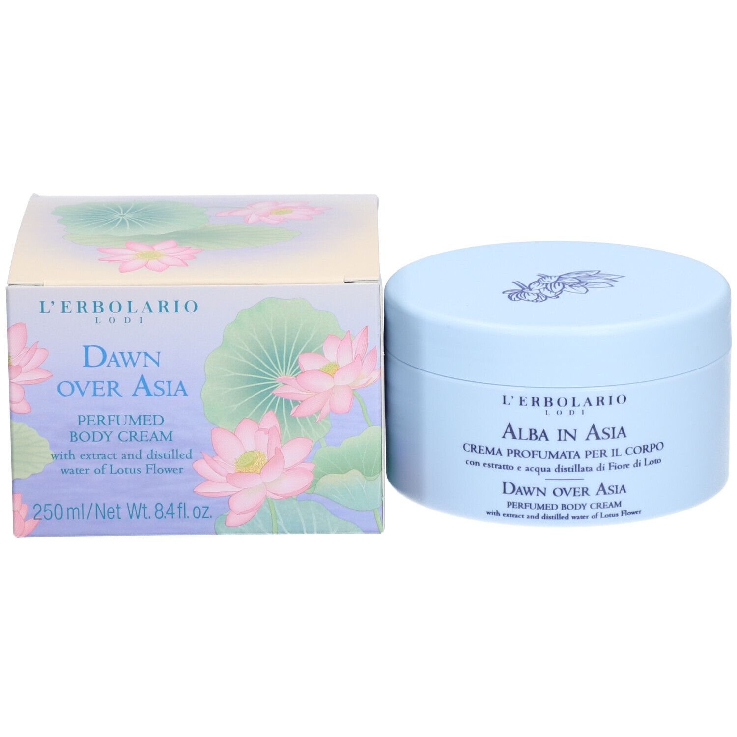 Pot de crème et emballage. Inscription : L'ERBOLARIO, DAWN OVER ASIA, PERFUMED BODY CREAM. Des fleurs de lotus sont représentées.
