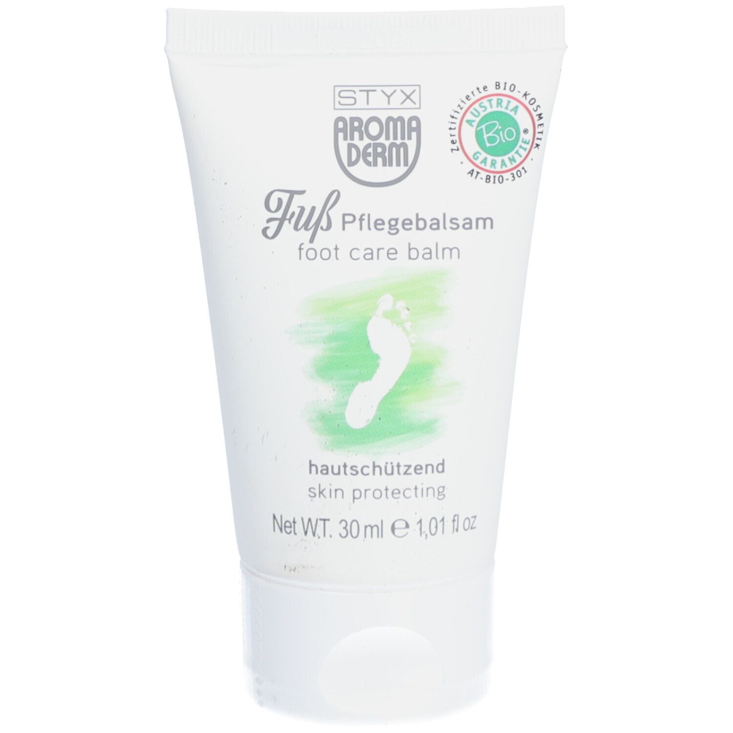 Tube blanche avec impression verte. Texte: STYX Aromaderm Fuß Pflegebalsam, label Bio. Illustration d'un pied.
