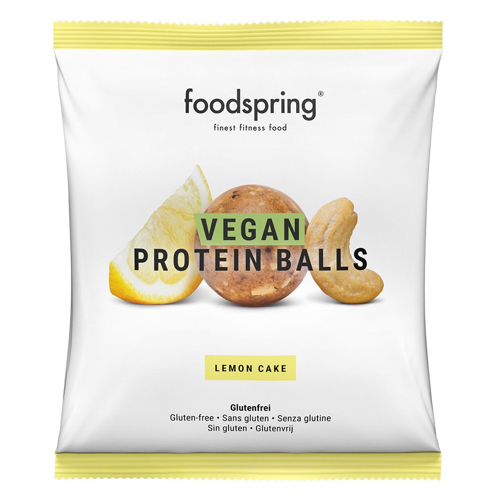 Paquet de Vegan Proteinballs Lemon Cake. Logo et nom du produit. Citron et noix de cajou illustrés. Sans gluten.