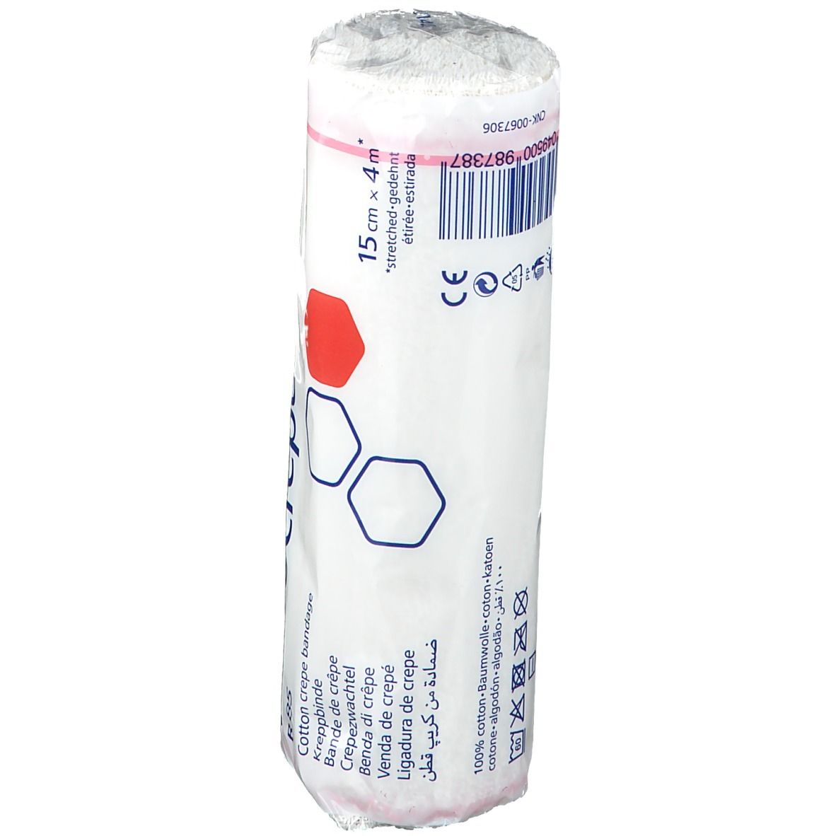 Rouleau de bandage dans son emballage. Inscription: 15 cm x 4 m, marquage CE, code-barres. Emballage avec design rouge.