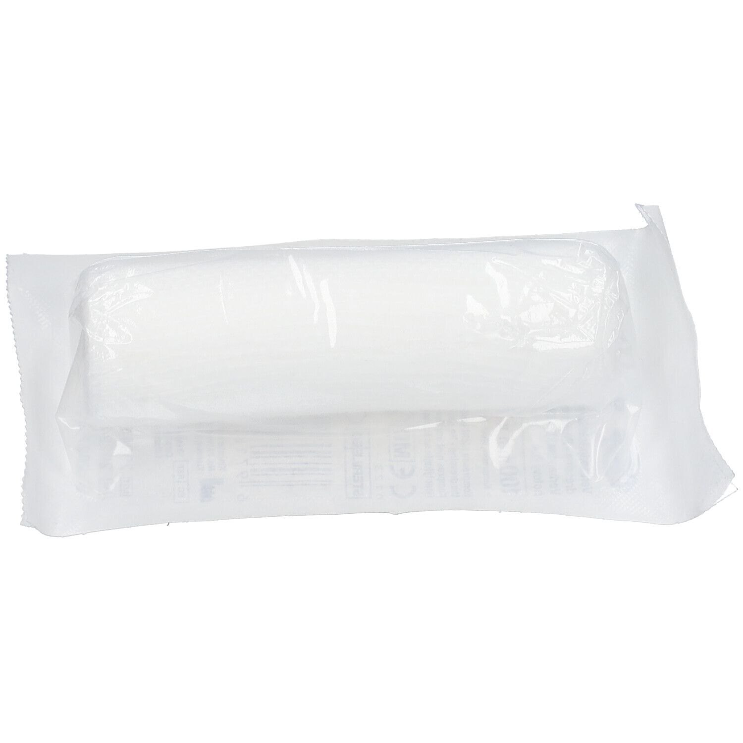 Pansement stérile dans un emballage plastique. Forme rectangulaire, matériau transparent. Nom du produit non visible.