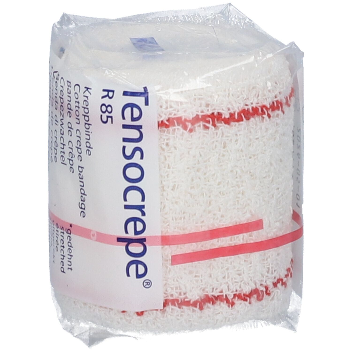 Bande de crêpe blanche roulée, rayures rouges. Inscription: Tensocrepe, R85. Emballée dans du plastique.