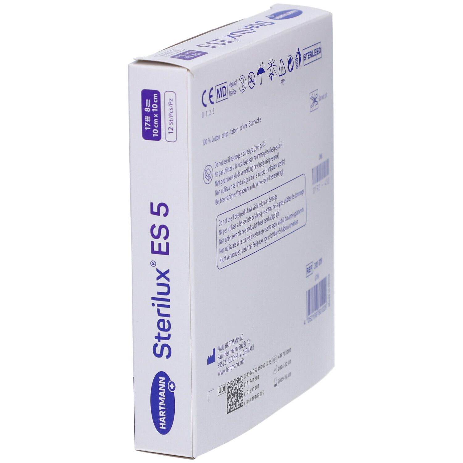 Boîte de compresses Sterilux ES 5 en biais. Inscriptions : 10x10 cm, 12 pièces, logo Hartmann, sceau Steril EO, marquage CE.