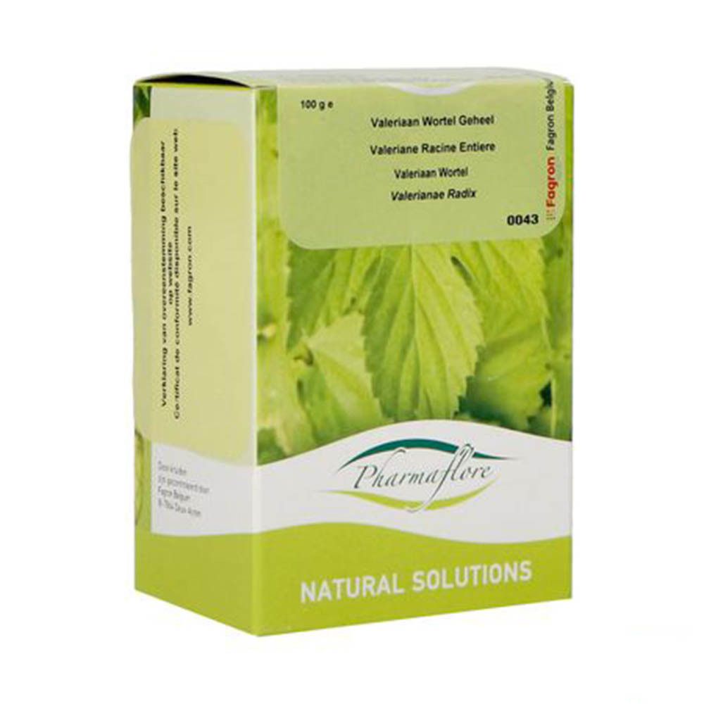 Boîte Pharmaflore. Inscription: Valeriana Racine Entiere. 100g. Vert et blanc. Motif de feuilles. Natural Solutions.