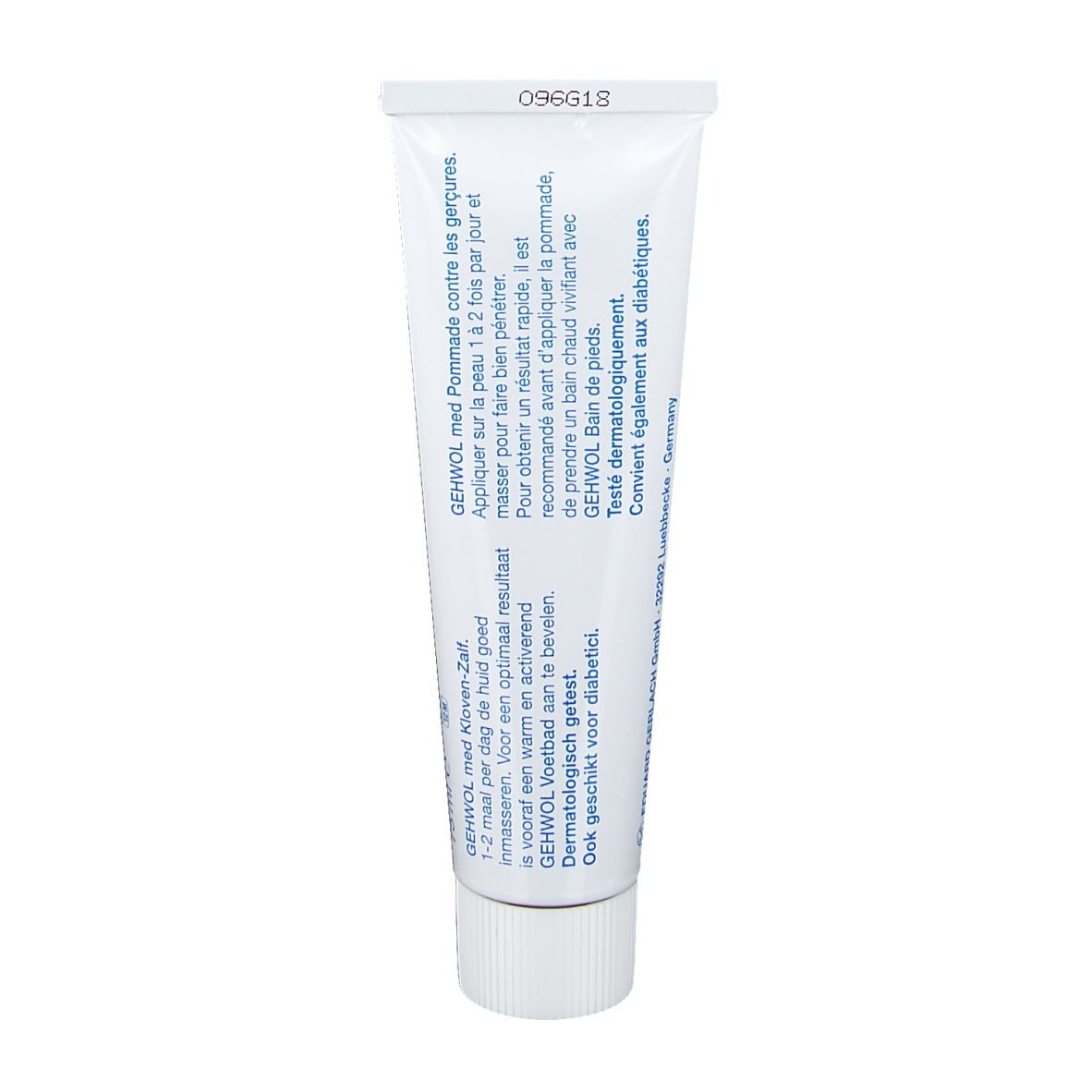 Dos d'un tube de crème. Texte en allemand, français et néerlandais. Fond blanc.