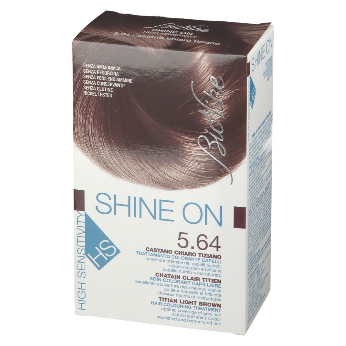 Boîte de coloration capillaire. Marque Bionike, nom du produit Shine On 5.64. Brun châtain. Sans ammoniaque, résorcine, conservateurs, gluten. Testé au nickel.