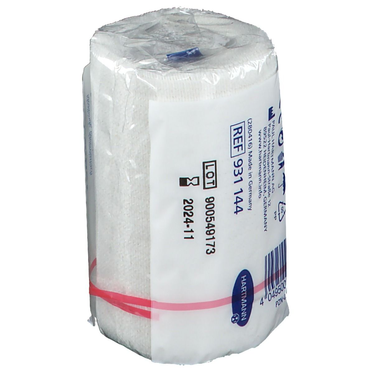 Rouleau de bandage Idealast en plastique. Inscriptions REF 931 144, numéro de lot et code-barres. Logo Hartmann.