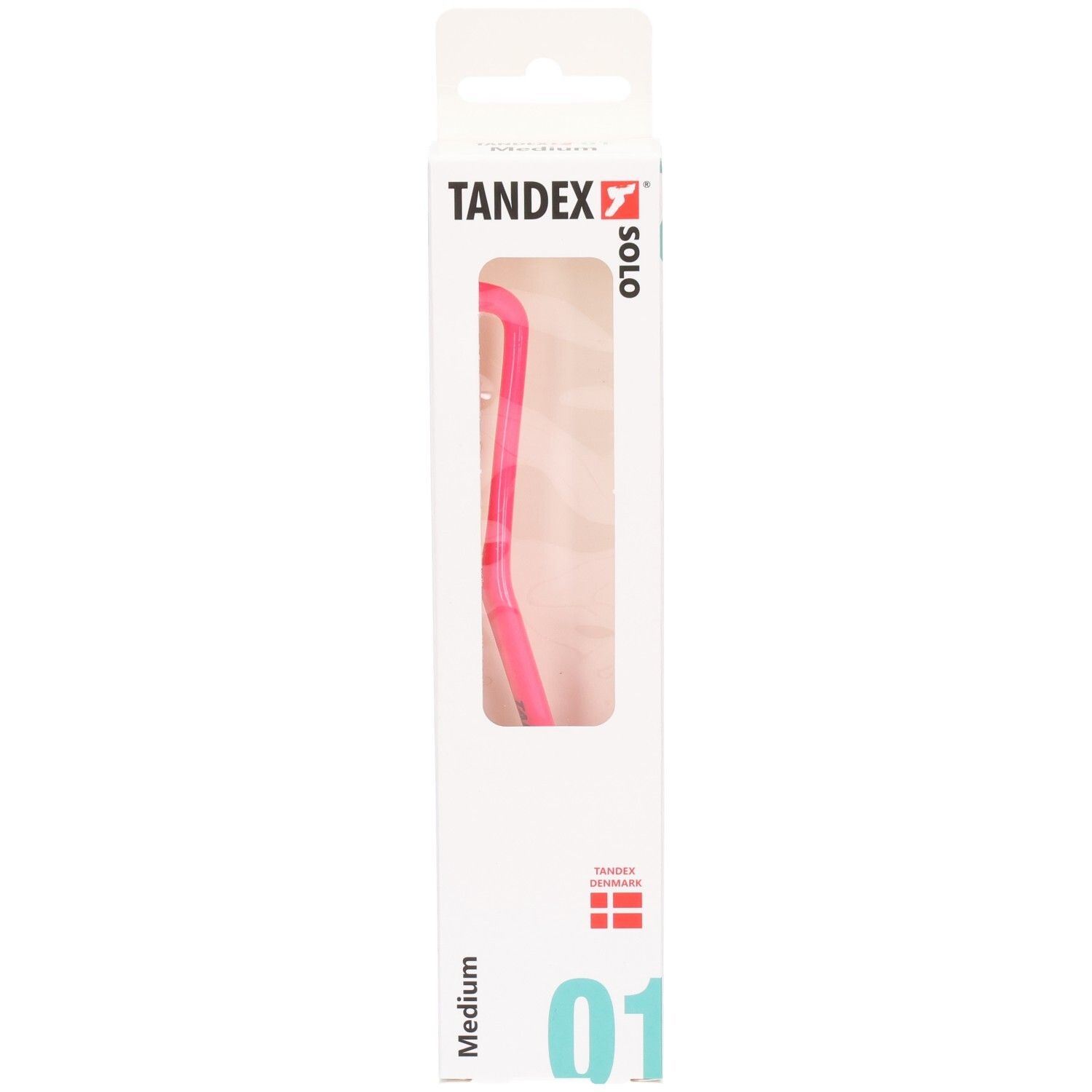 Emballage d'une brosse à dents Tandex Solo rose, Medium, montrant le produit.