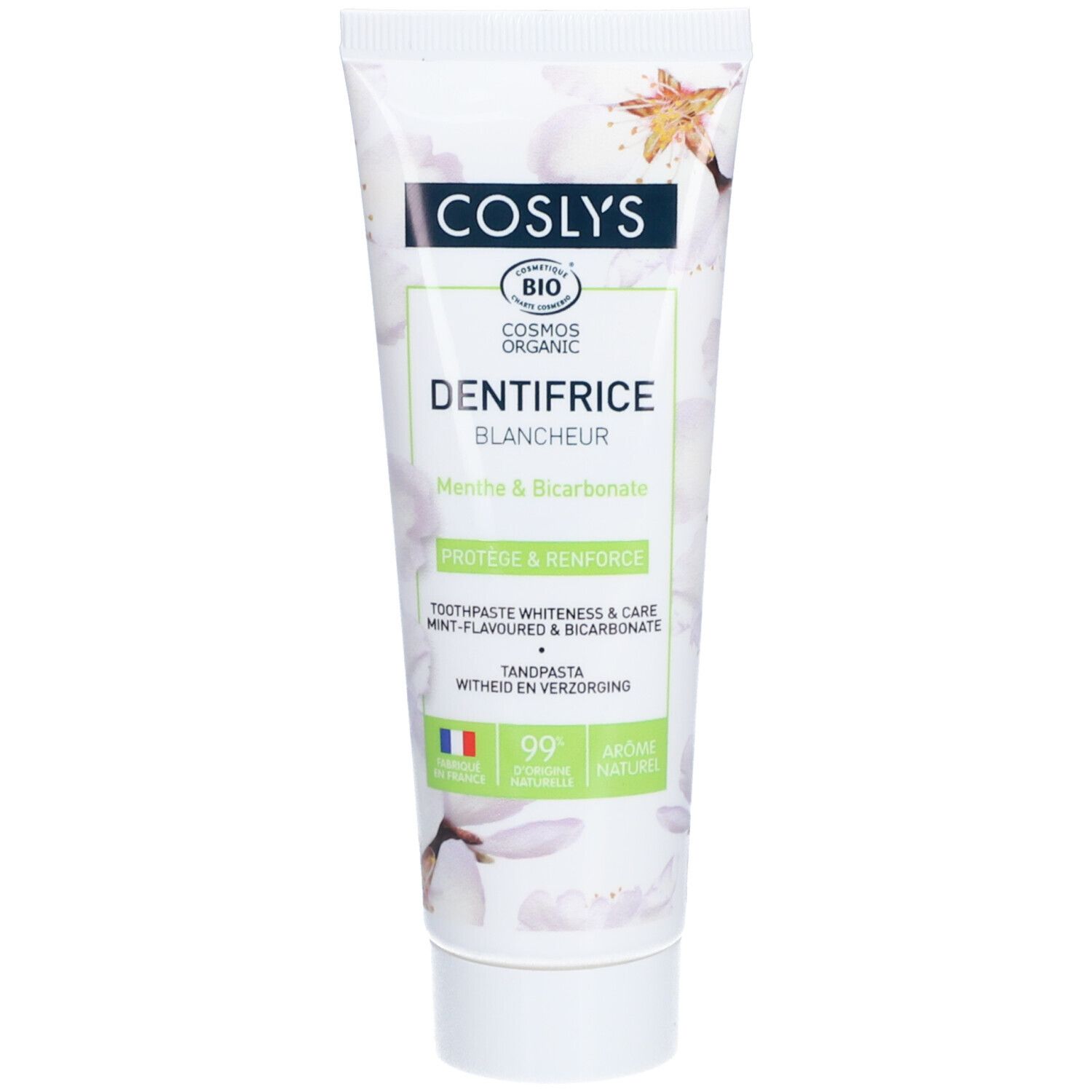 Tube de dentifrice blanc, motifs floraux. Inscription: Coslys, Dentifrice Blancheur, Menthe & Bicarbonate. Certification bio.