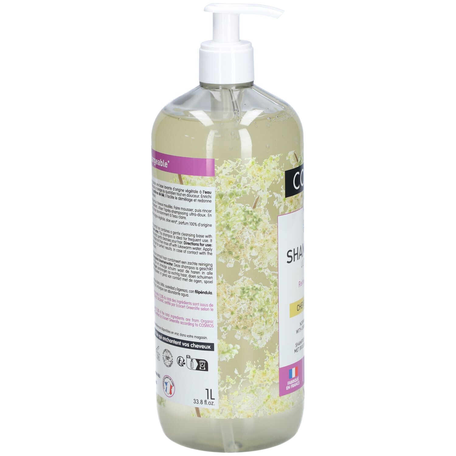 Flacon de shampooing transparent. Inscription Coslys, Shampooing Ultra-Doux. Label bio. Texte et logos au dos.