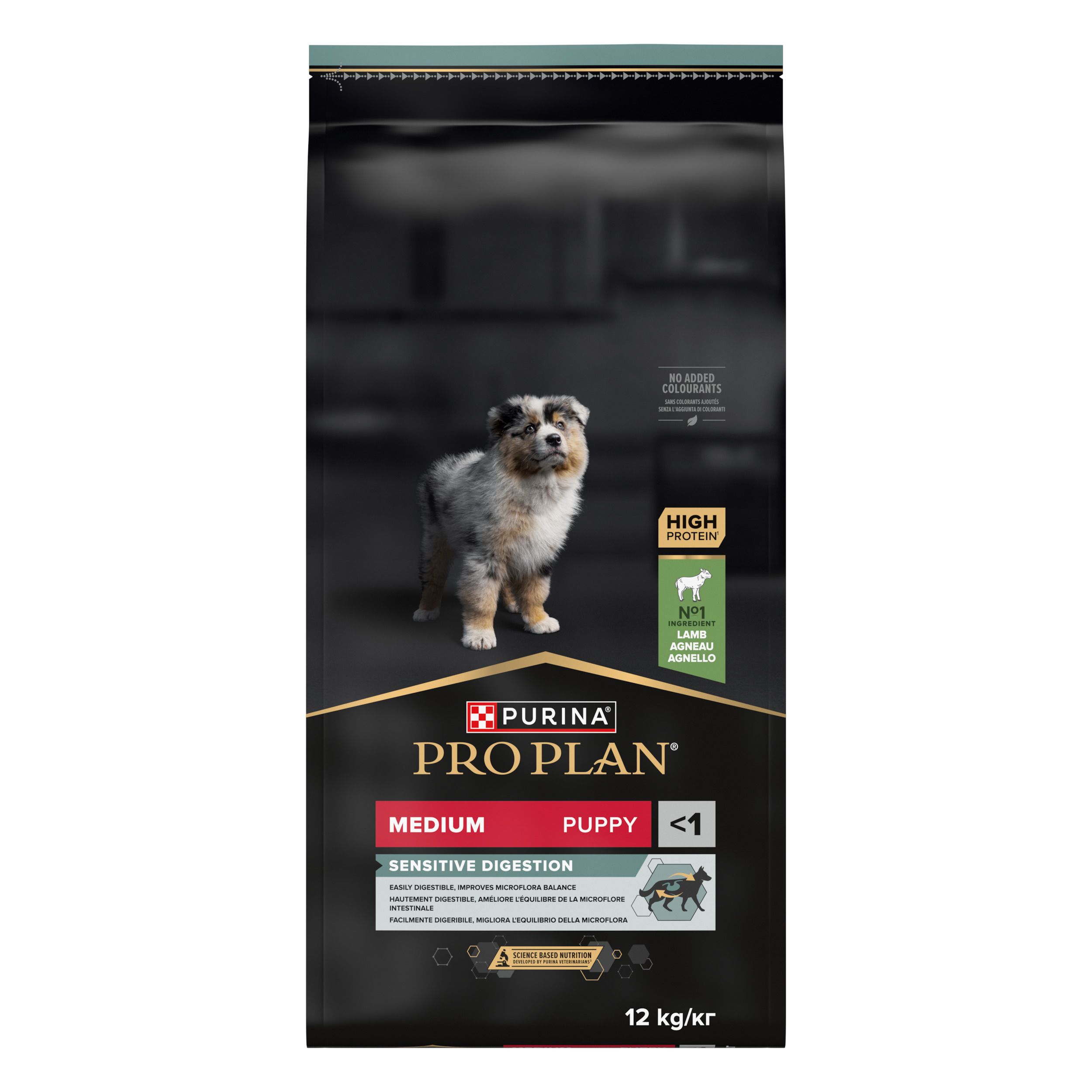 Sac noir de nourriture pour chiens. Inscription : PURINA PRO PLAN, Medium, Puppy, Sensitive Digestion. Image d'un chiot.