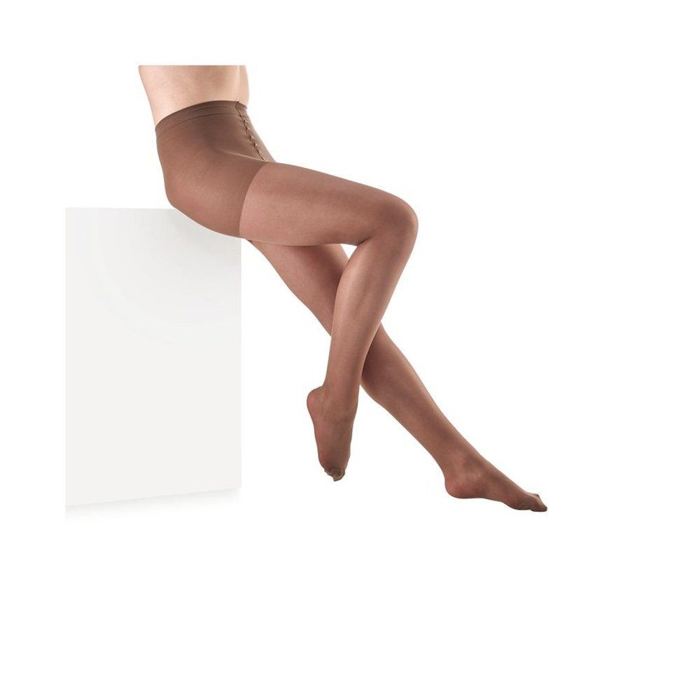 Collant Botalux, marron. Jambes assises sur un piédestal blanc.