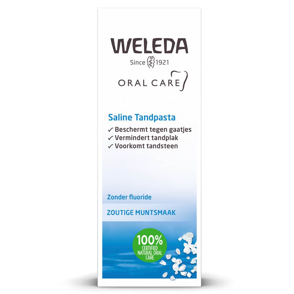 Tube de dentifrice Weleda Saline. Blanc, avec texte et illustrations bleues. Contient du texte en allemand, français et néerlandais. 100% naturel.
