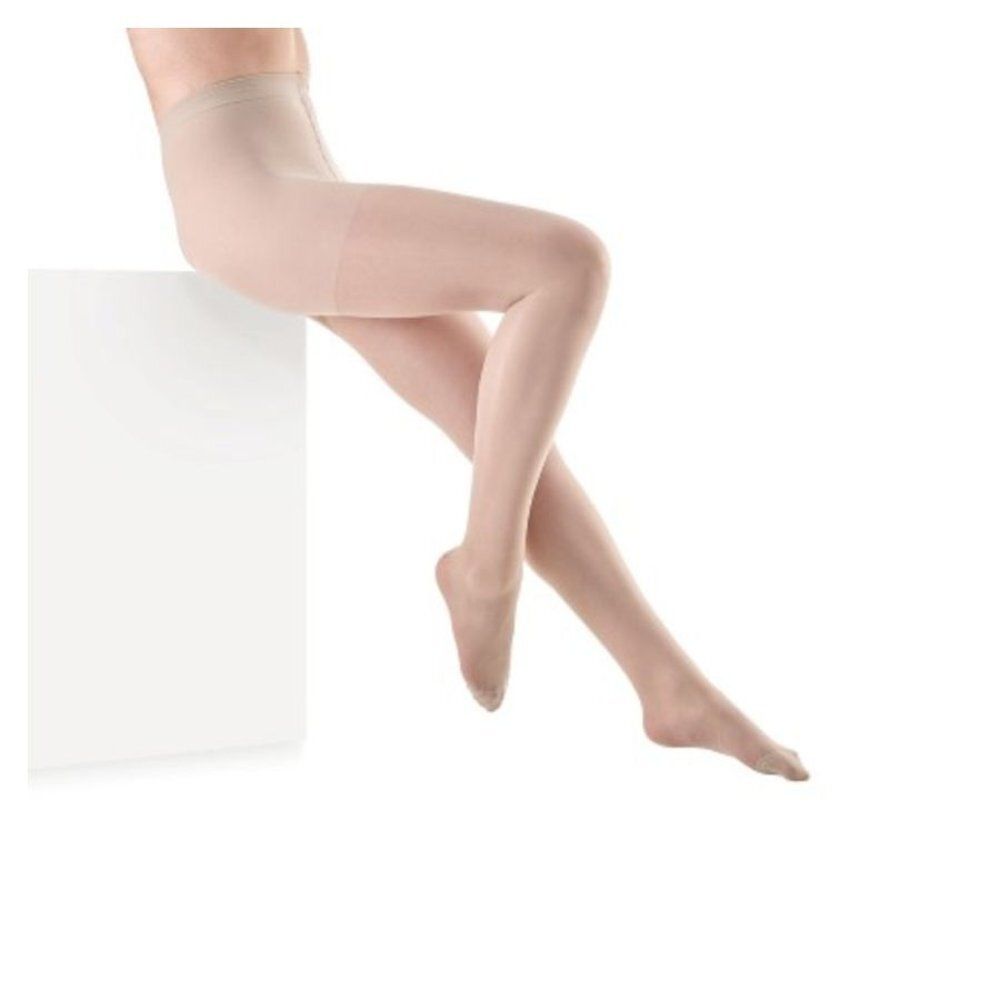 Emballage pour les bas Botalux 140. Des jambes sont représentées sur l'emballage. Trois cercles montrent différentes vues des jambes.