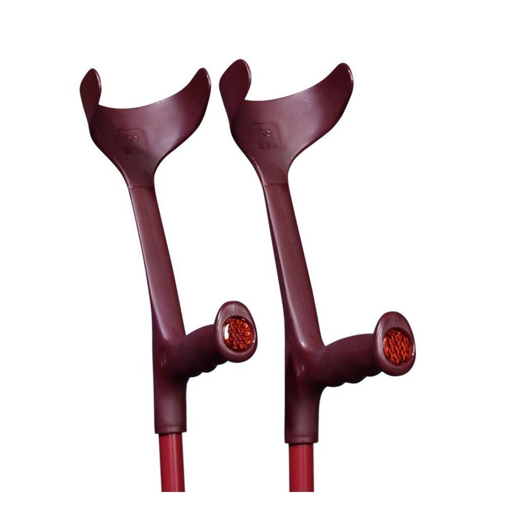 Deux béquilles aubergine. Modèle en aluminium avec support de bras et poignée. Tiges rouges.
