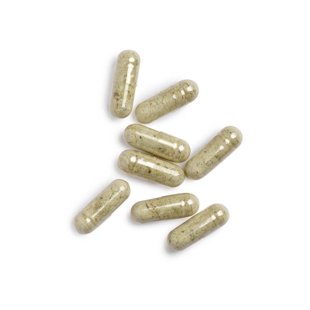 Capsules verdâtres. Sur fond blanc. 7 capsules.