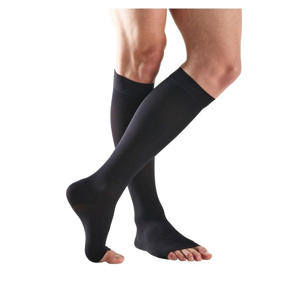 Bas de compression noirs, bout ouvert. Vue du produit sur fond blanc.