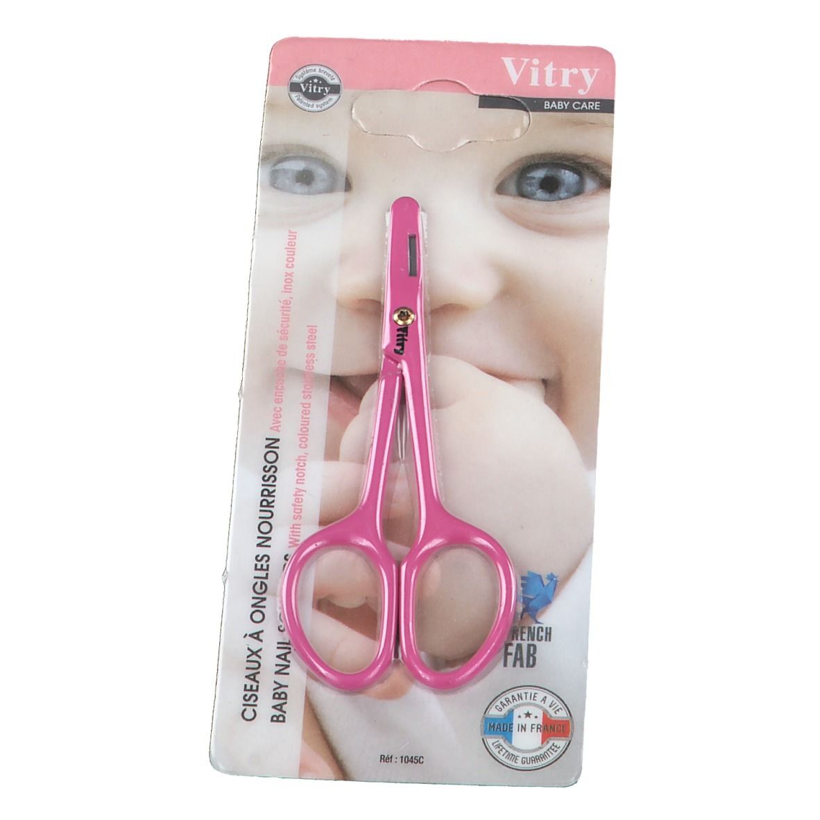 Ciseaux à ongles roses pour bébé, emballés. Marque Vitry. Sur l'emballage: visage de bébé, nom du produit, caractéristiques de sécurité.