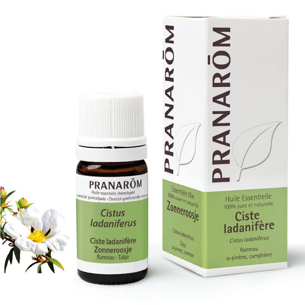 Flacon en verre brun et boîte. Boîte et flacon avec nom du produit et marque: PRANAROM. Bouchon blanc.