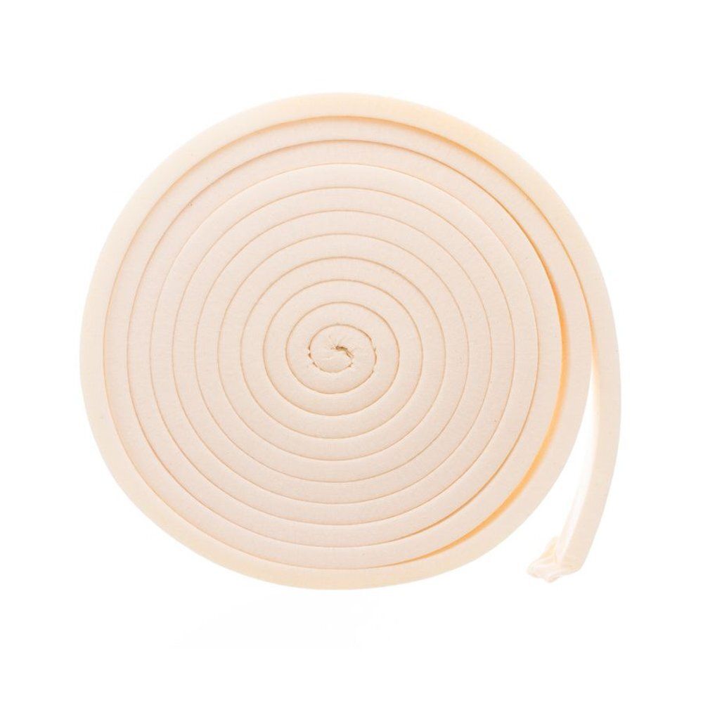 Rouleau de mousse beige enroulé. Produit à usage médical. Disposition en spirale.