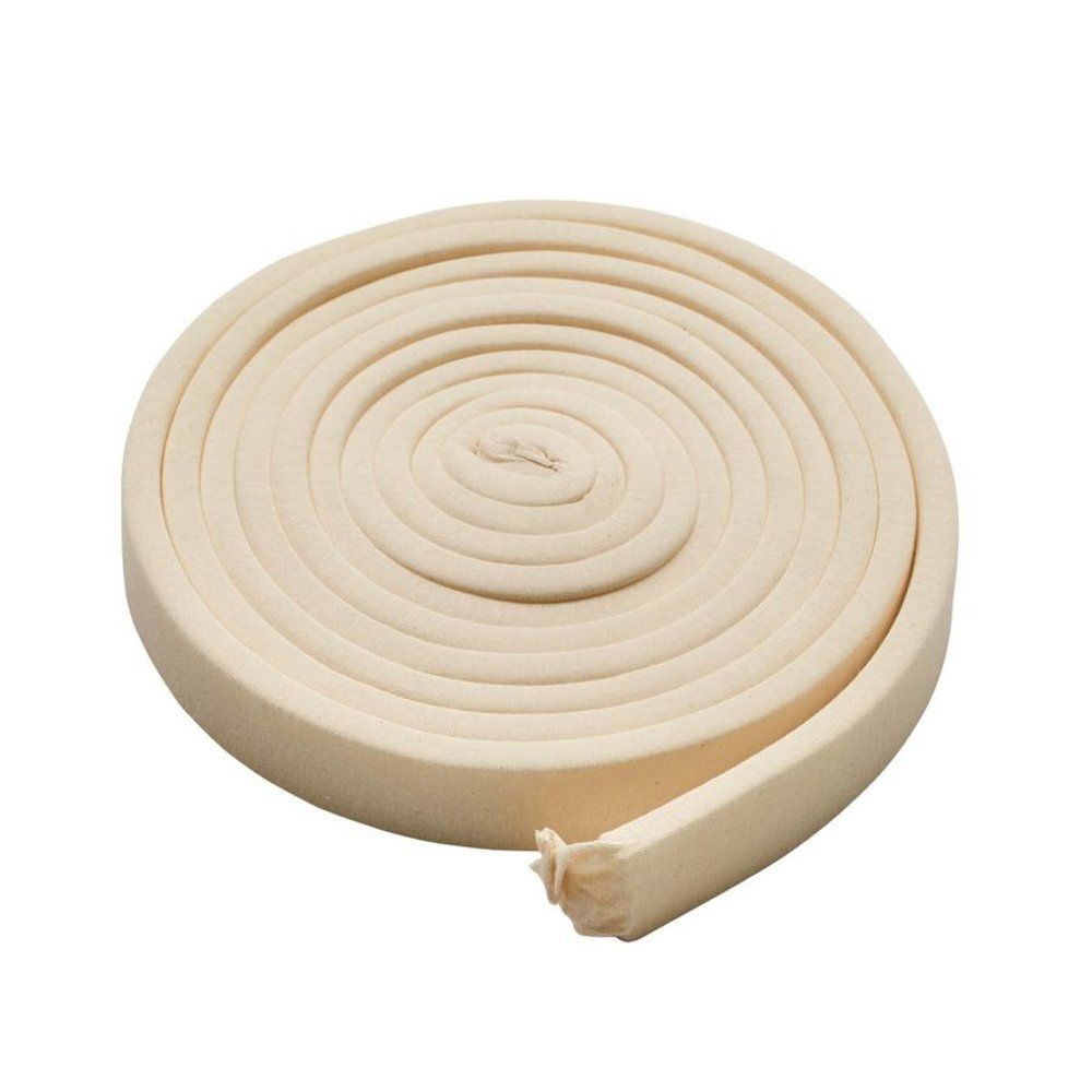 Rouleau de mousse beige enroulé. Produit à usage médical. Disposition en spirale.