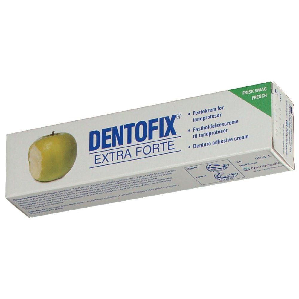 Boîte DentoFix Extra Forte. Emballage blanc avec accent vert et illustration de pomme. Texte: Crème adhésive pour prothèses dentaires.