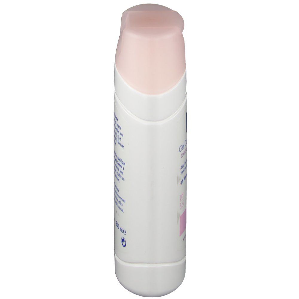 Vue latérale du flacon blanc avec bouchon rose. Texte et logo partiellement visibles.