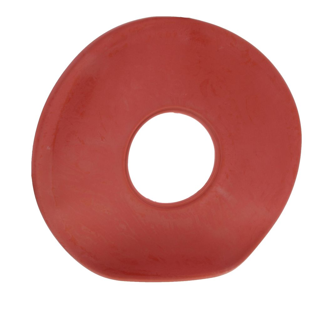 Objet rouge en forme d'anneau avec un trou au centre. Produit de bien-être.