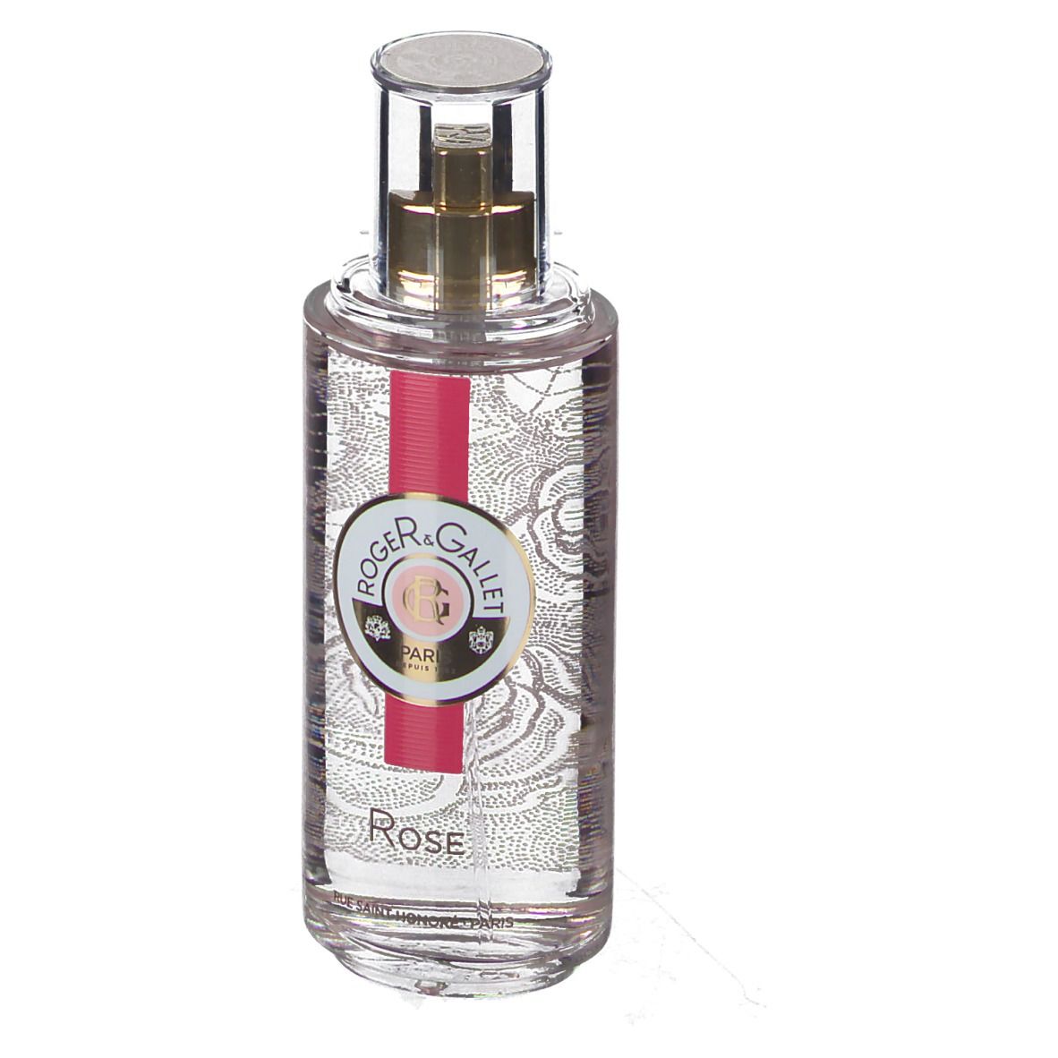 Flacon transparent avec vaporisateur doré. Étiquette avec logo et texte. Bande rouge. Inscription Rose.