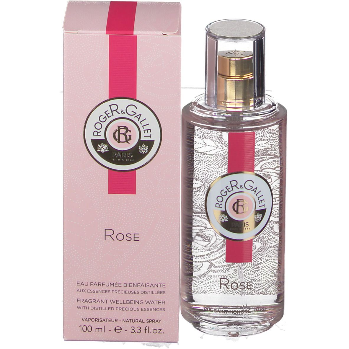 Flacon avec vaporisateur doré et emballage rose. Logo et texte sur flacon et emballage. Inscription Rose.