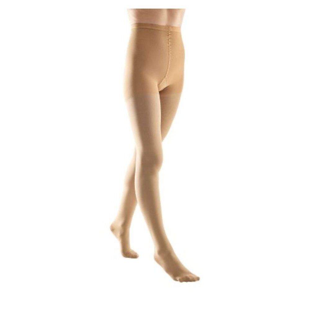 Panty de compression couleur chair. Vue de côté, montrant la forme et la coupe du produit.