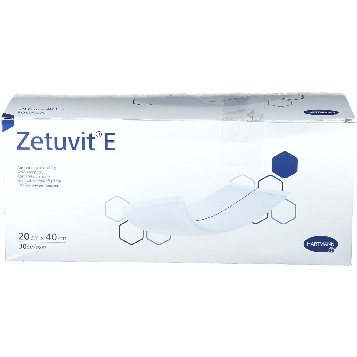 Boîte de compresses absorbantes Zetuvit® E. Inscription : 20 cm x 40 cm, 30 pièces/paquet. Marque Hartmann.