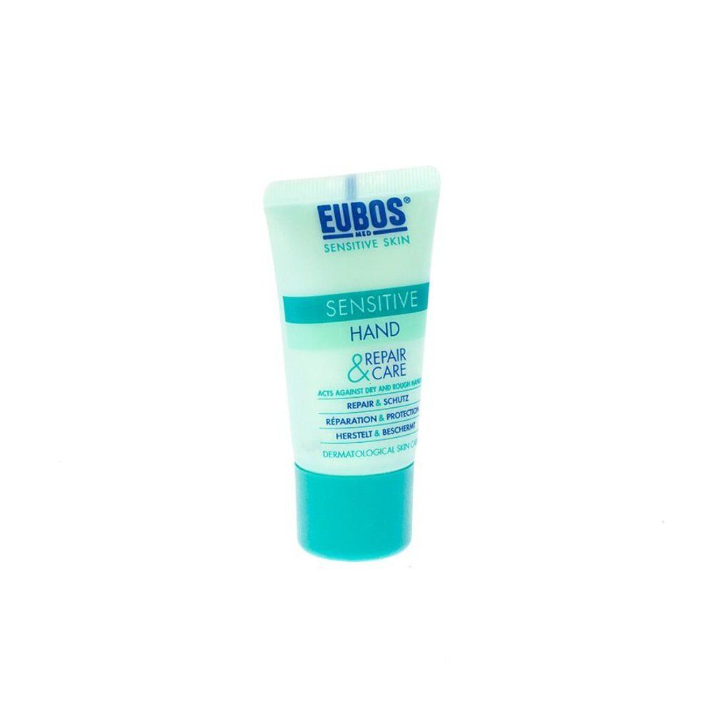 Tube bleu clair avec texte blanc. "EUBOS MED" en haut, suivi de "SENSITIVE SKIN". En dessous, "SENSITIVE HAND REPAIR & CARE".