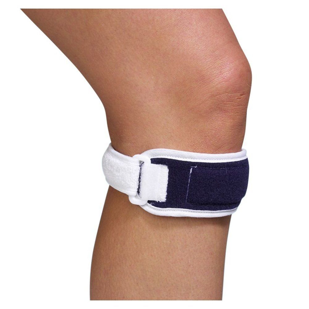 Genouillère blanche et bleue. Fixée au genou. Fermeture velcro.