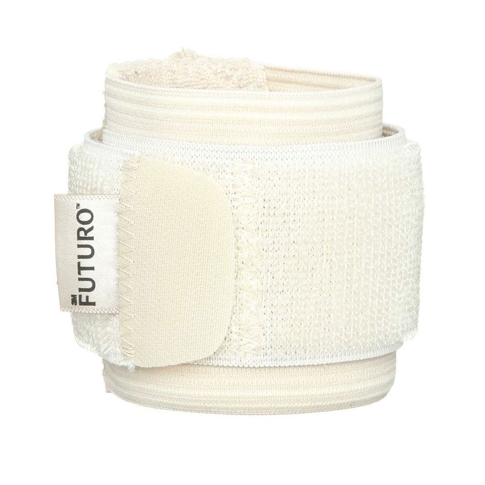 3M™ Futuro™ Bandage poignet beige. Boîte avec produit et main. Inscription: Réglable.
