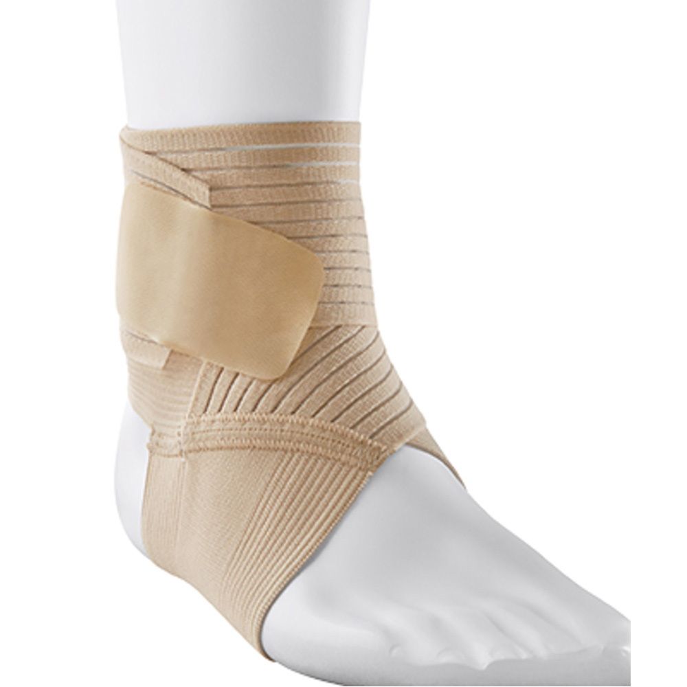 Chevillère Futuro™ taille M, en boîte. Bandage beige sur une jambe. Logos 3M et Futuro.